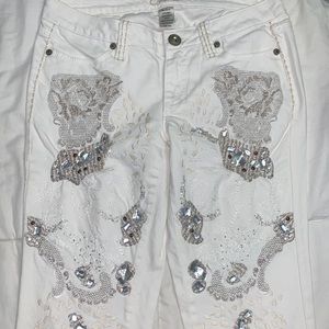 Long white gem and embroidered pants.